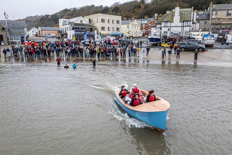 Harry Walker piloting boat he commissioned and built - a 19'6? strip planked, cold moulded 1954 launch (scamp) - with his fellow students. Harry is taking boat back to Worcestershire, where he will also be setting up his workshop and building more boats - photo © BNPS