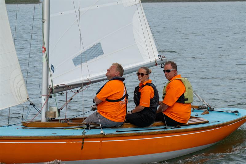 Justin Waples, Steve Rands and Vicky Brookes compete on RCOD 'Cormorant' during Burnham Week 2024 photo copyright Petru Balau Sports Photography / sports.hub47.com taken at Royal Corinthian Yacht Club, Burnham and featuring the Royal Corinthian One Design class