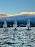 Dun Laoghaire Frostbites Series 1: (l-r) Messrs Butler, Oram and Phelan in close Aero action in Race 2 © Alyson Orr