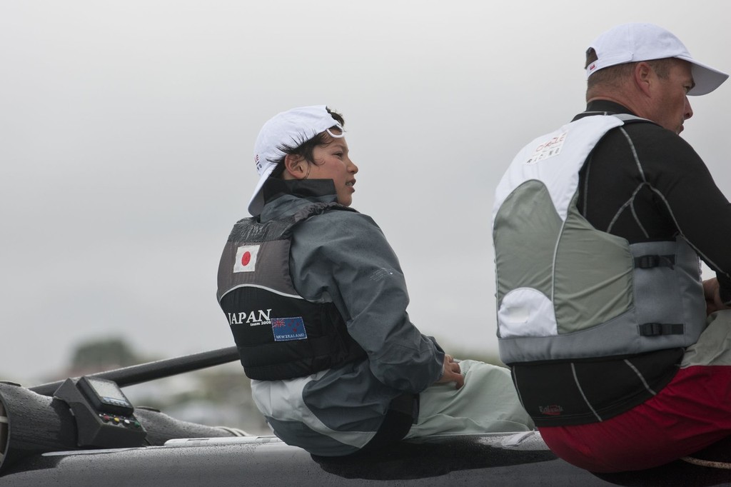 New Zealand national Optimist Champion, Leonard Takahashi-Fry on the handlebars of the AC45 - photo © Gilles Martin-Raget/Oracle Racing.com