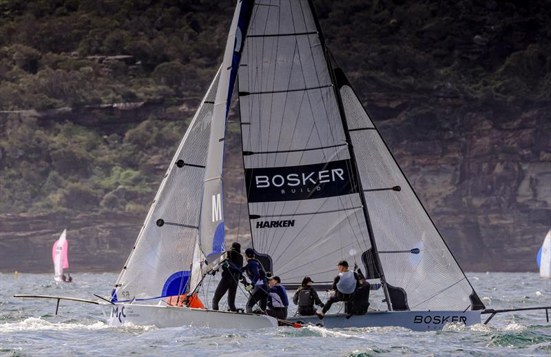 Manly 16ft Skiff Club Championship Heat 3: Hard to split MCC and Bosker at the top mark photo copyright SailMedia taken at Manly 16ft Skiff Sailing Club and featuring the 16ft Skiff class