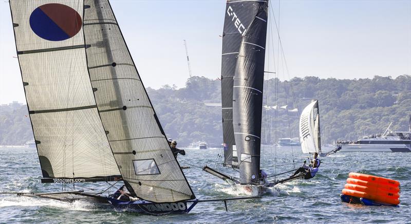 Winnings 2025 JJ Giltinan 18ft Skiff Championship Race 8 - Leaders approach the weather mark on the first lap photo copyright SailMedia taken at Australian 18 Footers League and featuring the 18ft Skiff class