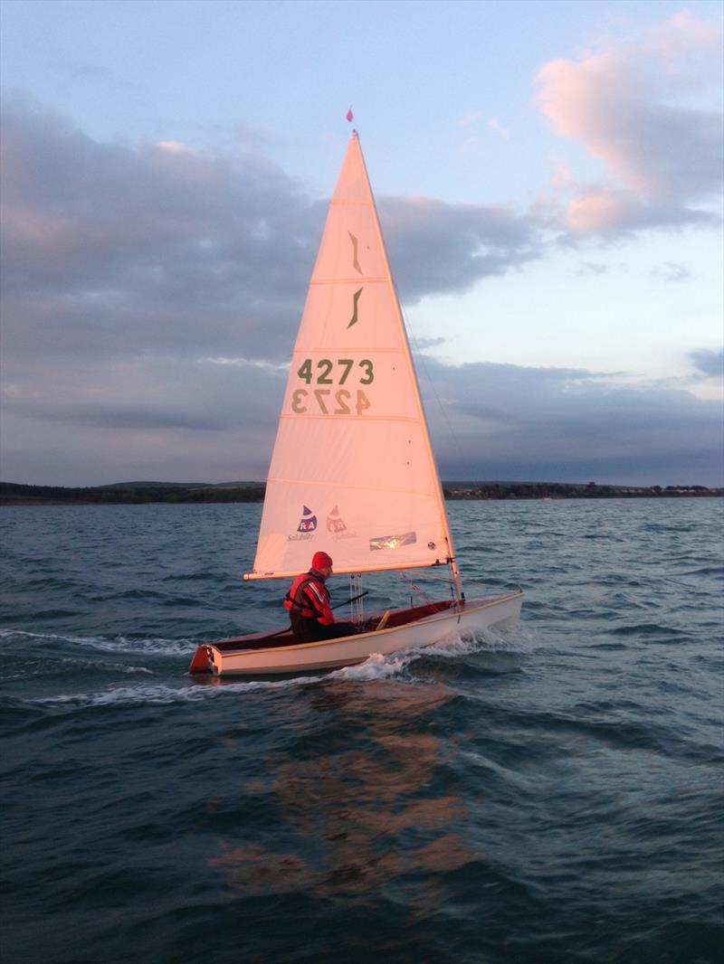 71 year old Ken Falcon sails a Solo dinghy around the Isle of Wight in aid of RYA Sailability photo copyright Ron Westcott taken at  and featuring the Solo class