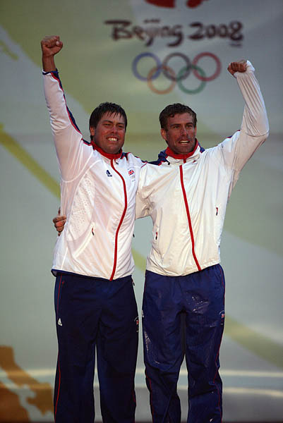 Iain Percy & Andrew 'Bart' Simpson (left) win Star gold at the 2008 Olympic Sailing Regatta photo copyright Richard Langdon / Ocean Images taken at  and featuring the Star class