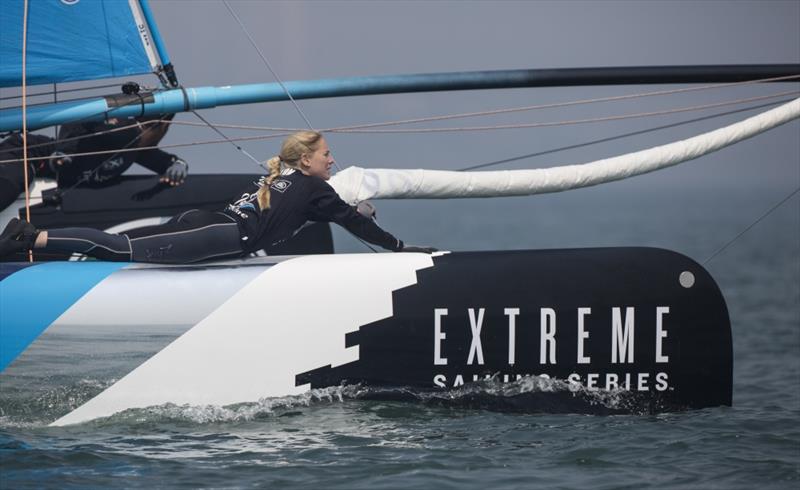 Sarah Ayton on the bow of The Wave, Muscat on day 1 of Land Rover, Extreme Sailing Series Act 3 Qingdao, for the 'Double Star Mingren' Cup photo copyright Lloyd Images taken at  and featuring the Extreme 40 class