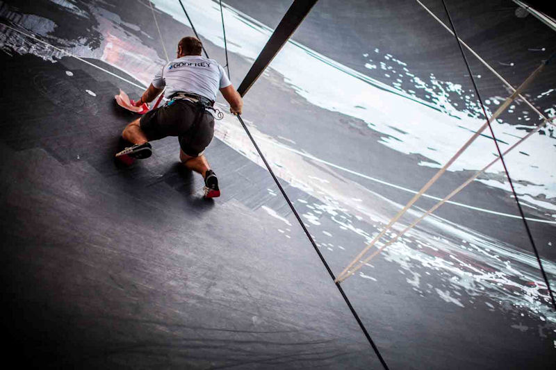 Ryan Godfrey goes aloft to repair a ripped sail soon after leaving Miami during leg 7 of the Volvo Ocean Race photo copyright Amory Ross / PUMA Ocean Racing / Volvo Ocean Race taken at  and featuring the Volvo 70 class