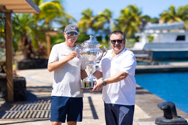 Christian Zugel, Tschüss 2 holds the magnificent winners trophy presented by RORC Racing Manager Steve Cole - photo © Arthur Daniel / RORC