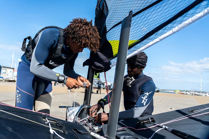 Greig City Academy students Felipe and Corneille get to grips with the WASZP boats at a training camp in Weymouth - photo © L.Goldman / INEOS Britannia