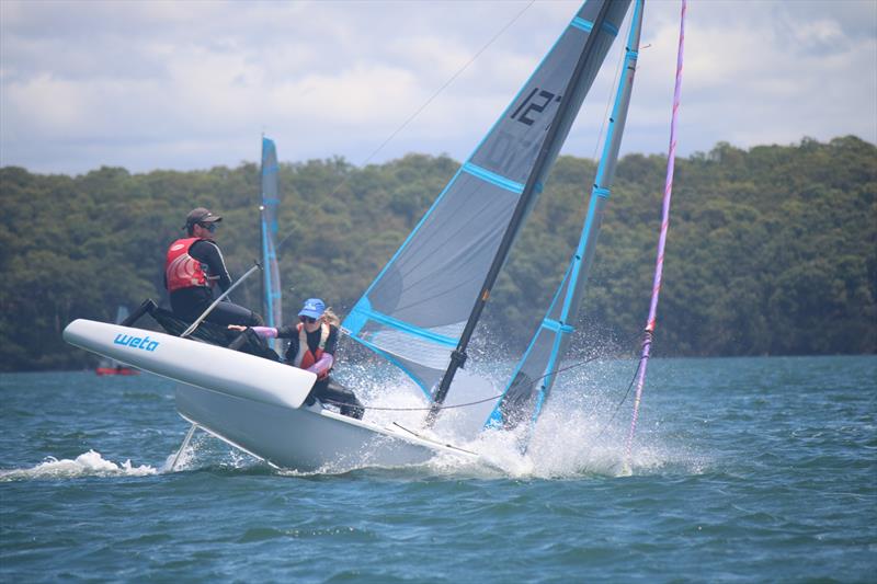 Ryan McVey and Gracie Allen winning the 2ups, having a tender moment - photo © Paul Bellamy