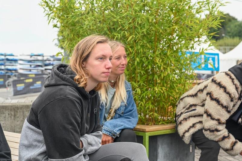 Maaike Huvermann and Lisa Kloster focused at the Skippers Meeting - 2024 Freestyle Pro Tour Geneva day 1 - photo © PROtography Official