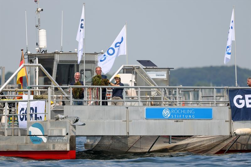 The `SeeKuh I`, built in Lübeck, collects seaweed that has been pulled from the surface of the water in the Bay of Strande during Kieler Woche - photo © Christian Beeck