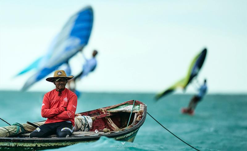 Local fishermen play an active role at the WingFoil Racing World Cup photo copyright IWSA media / Robert Hajduk taken at  and featuring the Wing Foil class