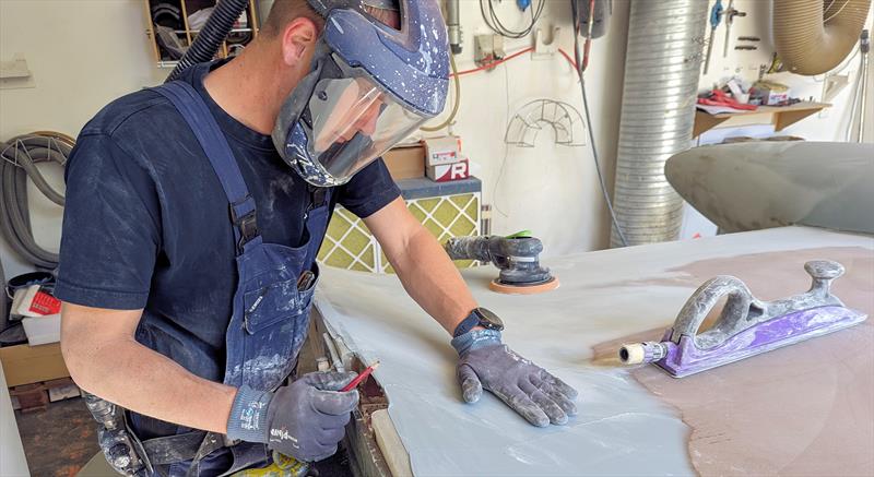 Fairing the keel to ensure a perfect finish - photo © Mark Jardine